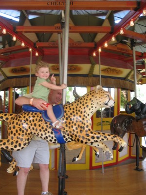 tn_Reese and Adam merry go round 2.JPG