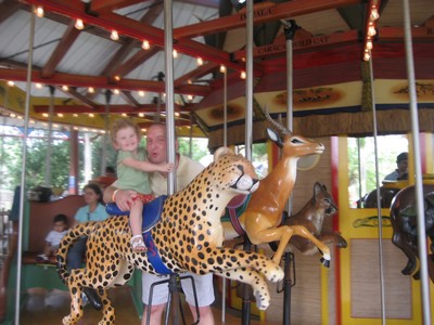 tn_Reese and Adam merry go round.JPG